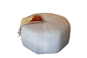 Upholstered octagonal pouf