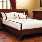 Bed with low footboard