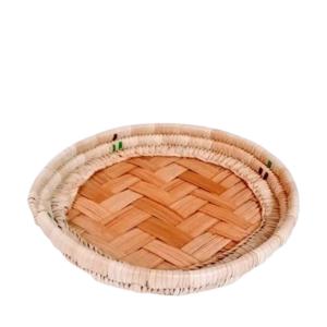 Round palm leaves and fruit bunch plate